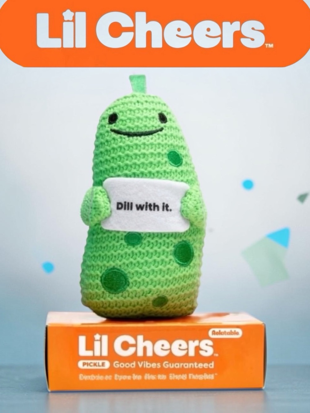Lil Cheers Green Crocheted Pickle Plush holding a sign that says- 'Dill With It’
